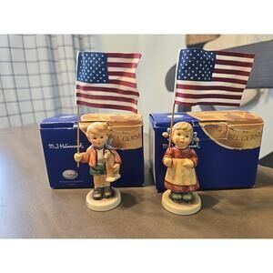 M.J GoebelHummel Little Flag Bearer 239/E (2002) and Miss Patriot 2077/A (1999)